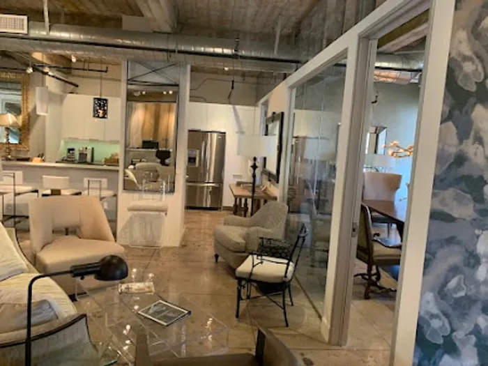 Open loft office with glazed partitions